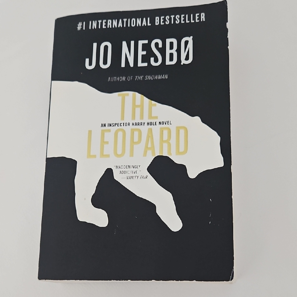 The Leopard Paperback - Black and White Cover